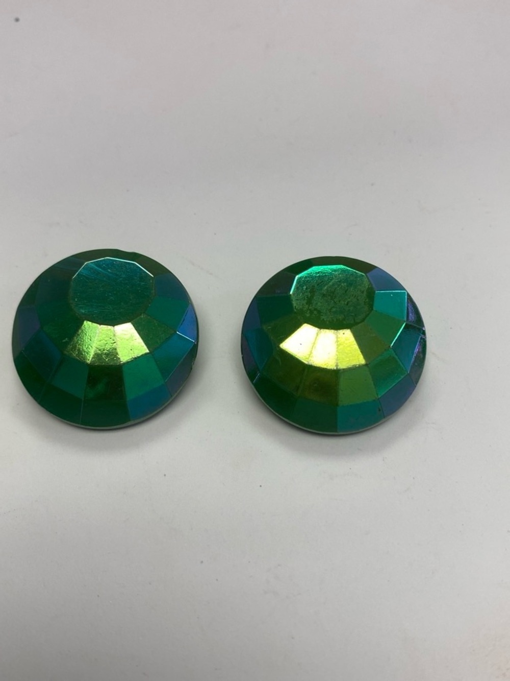 Vintage West Germany clip on earrings Green Iridescent Faceted Round
